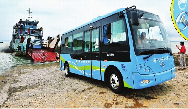 Minibuses take the road in Caoyu Island in Pingtan